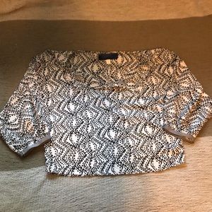 Francesca’s black and white patterned top